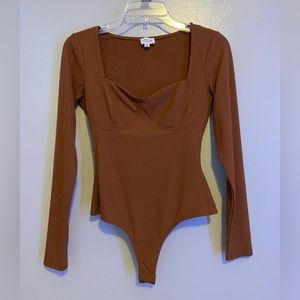 brown body suit